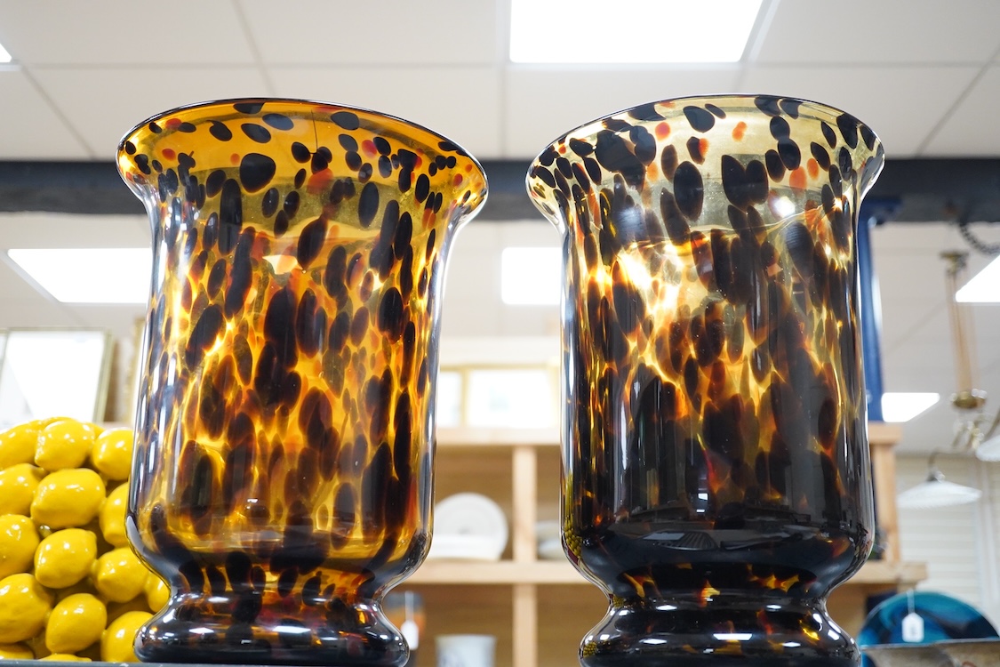 In the style of Murano, a pair of Italian hand blown ‘tortoishell’ glass vases, 31cm